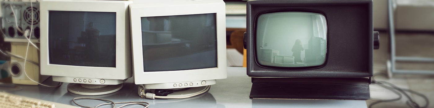 3 old, boxy computers ready for computer recycling