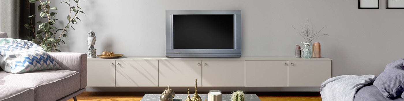 Living room with old TV ready for disposal and recycling