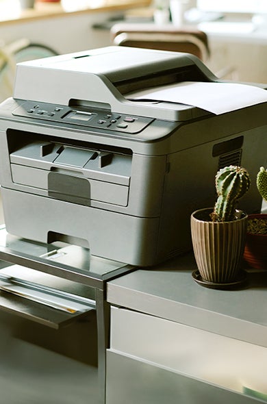 An old printer ready for recycling and disposal