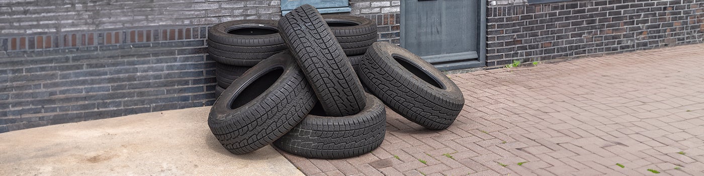 Tires in a pile that need disposal or recycling