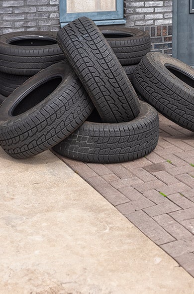 Tires in a pile that need disposal or recycling