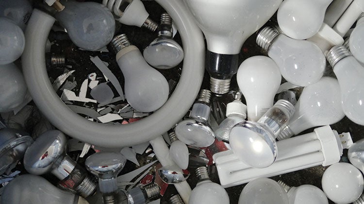 A collection of different types of light bulbs, including incandescent, halogen, LED, and CFL bulbs, and fluorescent tubes