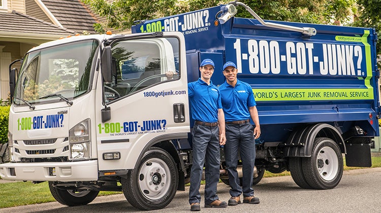 1-800-GOT-JUNK? Truck team ready to take away your old washer and dryer