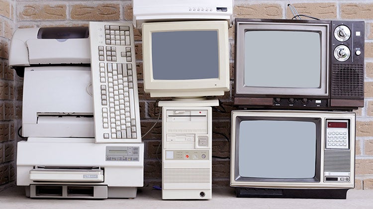 Stacked pile of outdated electronics